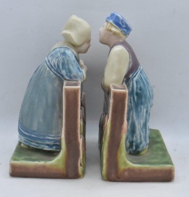 Pair of mrkd. Rookwood Art Pottery bookends, #6022 dutch boy and girl, dated XXIX - 3