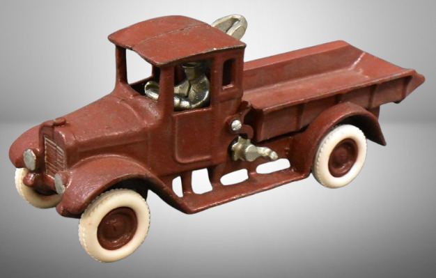 Cast Iron Arcade International Harvester dump truck w/ driver