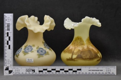 (2) Fenton Art Glass custard 7" vases: log cabin scene; blue flowers - 9