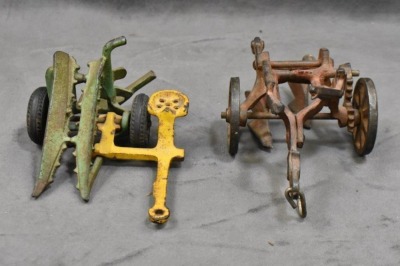 (4) Cast Iron toy implements: 2-botttom plow (Arcade), corn sheller (Arcade), disc (Arcade) & hay rake (Kenton?, larger) - 8