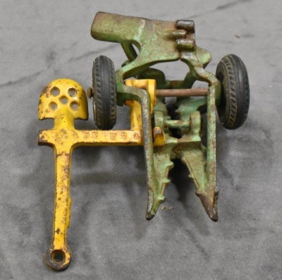 (4) Cast Iron toy implements: 2-botttom plow (Arcade), corn sheller (Arcade), disc (Arcade) & hay rake (Kenton?, larger) - 12