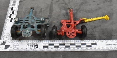 (4) Arcade Cast Iron toy implements: hay rake, 2-botttom plow, sickle-bar mower & 2-row planter - 10