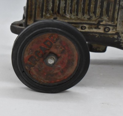 Arcade cast iron McCormick Deering tractor, rubber tires, 7"l - 5