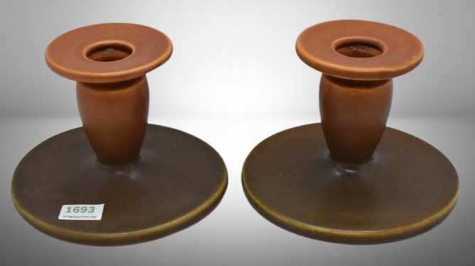 Pair of Roseville Rosecraft (Colors) 1029-3" candleholders, burnt orange