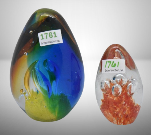 (2) Egg-shaped glass paperweights, 3" and 4"