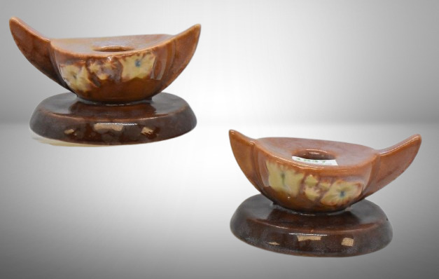 Pair of Roseville Wincraft 2CS1 candleholders, brown/ tan