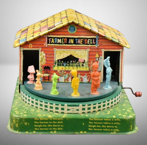 Farmer in the Dell tin-litho wind-up music maker carousel toy