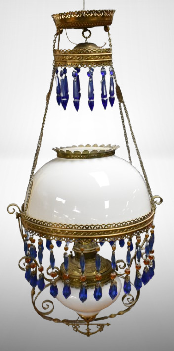 Victorian brass hanging oil lamp w/ white font and shade, brilliant blue and amber prisms