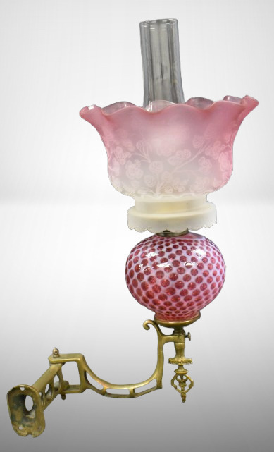 Bracket kerosene lamp, cranberry opalescent font w/ pink to clear frosted shade