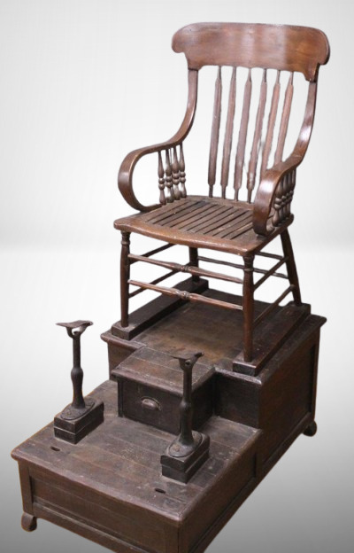Antique oak shoe shine stand, 2-tier stand, cast iron foot rests