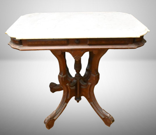 Eastlake-style marble top parlor table, nicely carved skirt and base