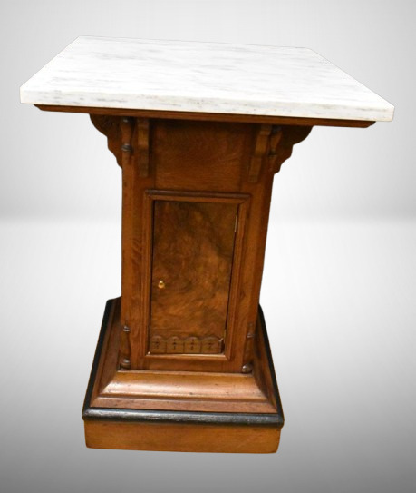 Marble top pedestal w/storage space in ornate base