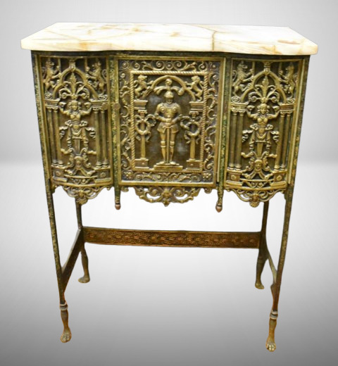 Marble top bronze entry cabinet, bronze work features standing figures, lions and faces, all against red velvet, paw feet, mrkd. Design and