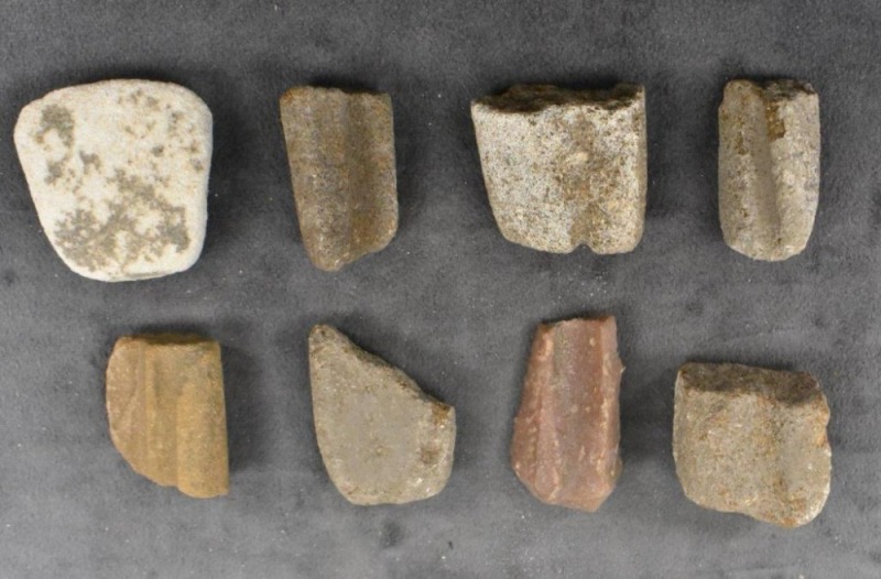 Grouping of sandstone sharpening stones dug in Kiowa Co., KS