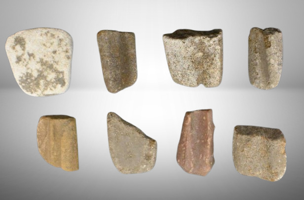 Grouping of sandstone sharpening stones dug in Kiowa Co., KS