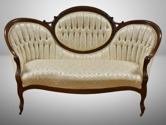 Victorian parlor sofa, curved back design and legs, tufted back