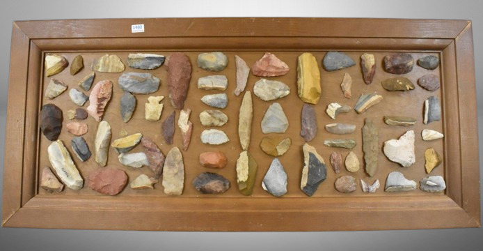 Display board of Native American Indian arrowheads and points