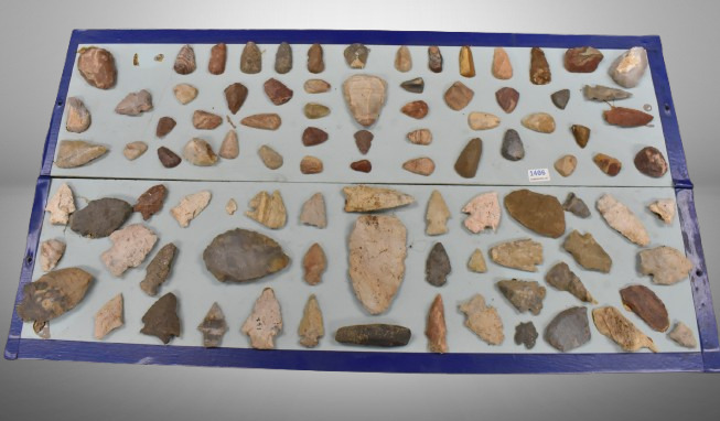 Display board of Native American arrowheads, points, etc.
