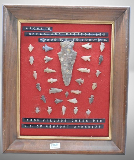 Native American Indian artifacts display of archaic spear and projectiles