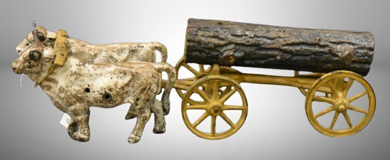 early Hubley cast iron Oxen Drawn Log Wagon - missing the rider