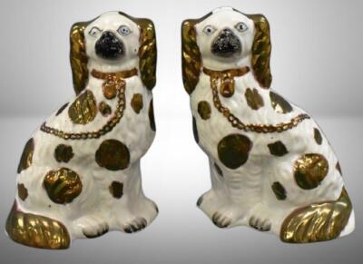 Pair of Victorian Staffordshire spaniel dog figures w/ greenish/ gold luster decoration, 10" tall
