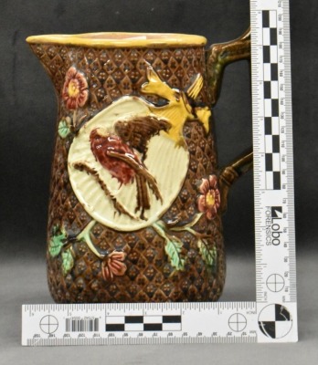 Majolica 8" pitcher w/ bird and floral decorations - 9