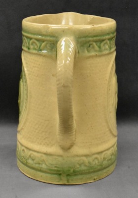 Yellow ware 8" pitcher w/ design of grazing cows - 2