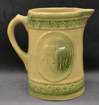 Yellow ware 8" pitcher w/ design of grazing cows - 3