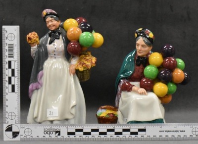 (2) Royal Doulton figurines: HN 1315 The Old Balloon Seller, 7.5"; HN 1843 Biddy Pennyfarthing, 8.5" - 10