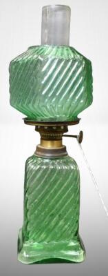 Green depression glass miniature oil lamp, swirl pattern