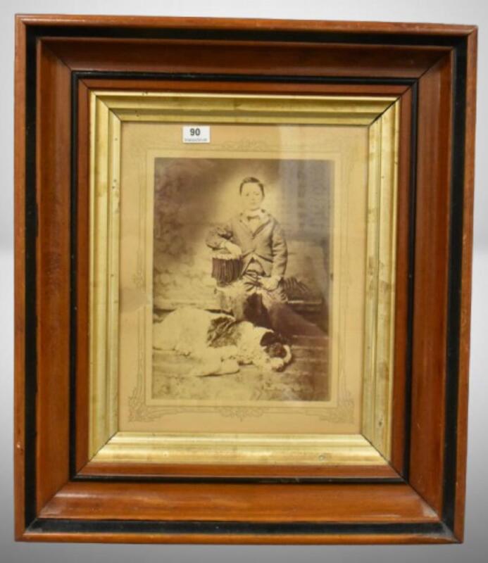 Old photo of young boy with his best friend
