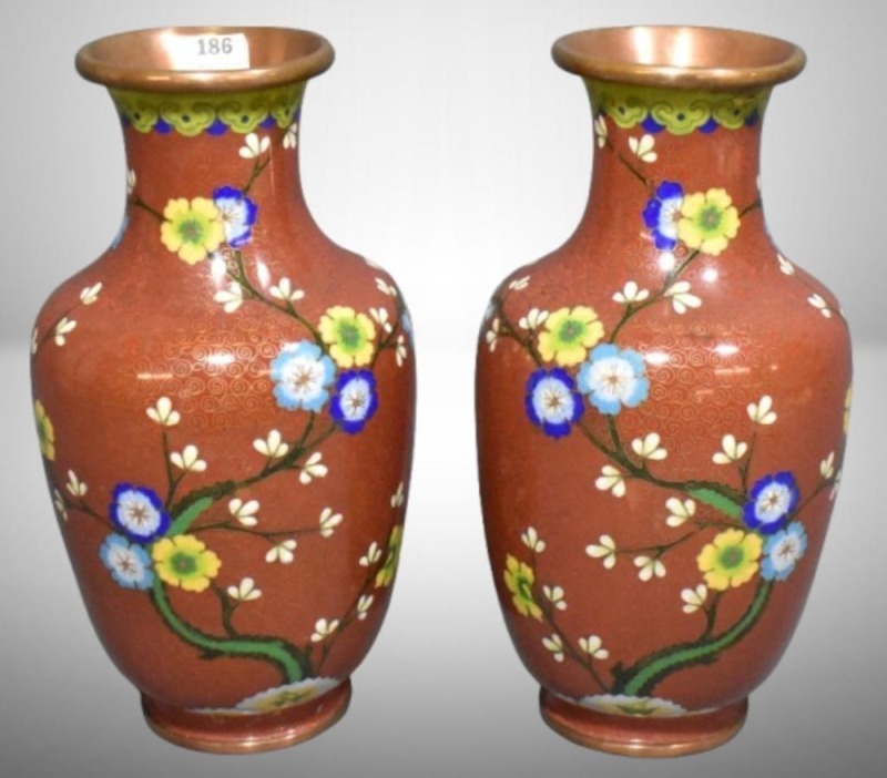 Pair of Cloisonne vases, floral design on reddish-brown background