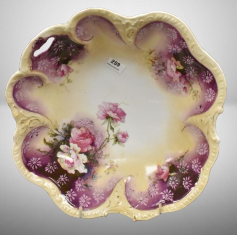 Prussia-style 10"d bowl, embossed star mark, floral design