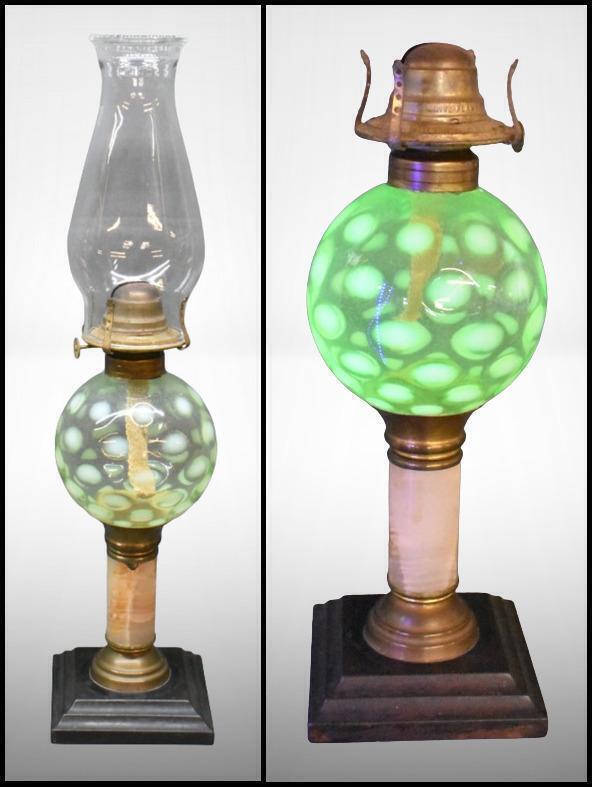 Pastel green opalescent Coin Spot kerosene lamp on marbled-style stem and black base