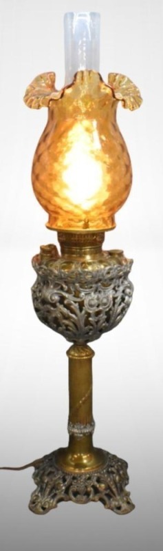 Victorian electrified Success oil lamp, iron pedestal with amber ruffled shade