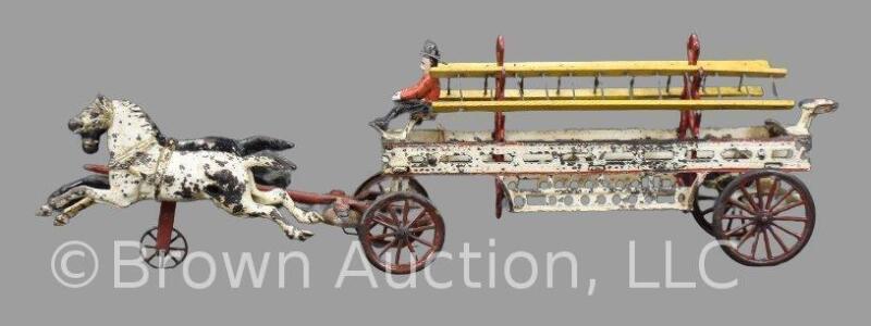 Cast Iron Hubley 2-horse drawn hook and ladder fire wagon w/ driver