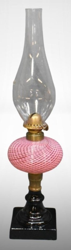 Victorian cranberry opalescent kerosene lamp on black marble base