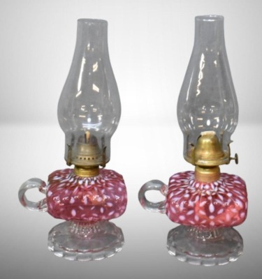 (2) Hobbs Snowflake Cranberry Opalescent finger lamps on pedestals