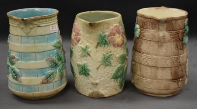 (3) Majolica 6" milk pitchers, all w/ plant or floral decorations - 2