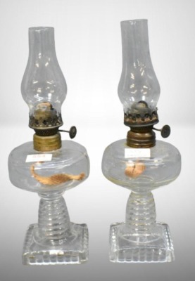 (2) Clear miniature oil lamps on square bases