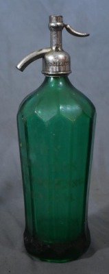 (2) Seltzer bottles: 1-"Schultz Carbonic", clear, 9.5"h; 1-mrkd. Czechoslovakis, green, 12.5"h - 2