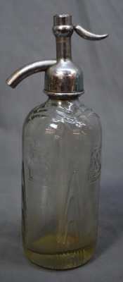 (2) Seltzer bottles: 1-"Schultz Carbonic", clear, 9.5"h; 1-mrkd. Czechoslovakis, green, 12.5"h - 3