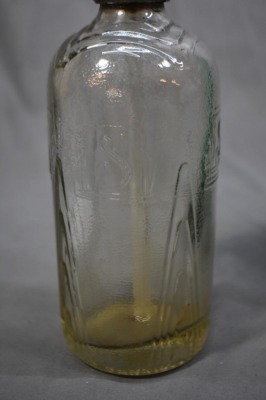 (2) Seltzer bottles: 1-"Schultz Carbonic", clear, 9.5"h; 1-mrkd. Czechoslovakis, green, 12.5"h - 6
