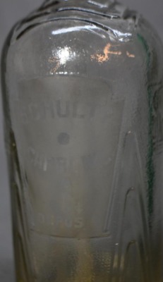 (2) Seltzer bottles: 1-"Schultz Carbonic", clear, 9.5"h; 1-mrkd. Czechoslovakis, green, 12.5"h - 8