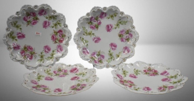 (4) Mrkd. Austria 9"d luncheon plates decorated w/ pink roses