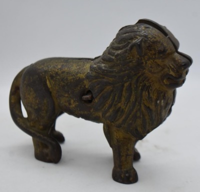 Hubley Cast Iron Lion still bank (tail resting on right side) - 2