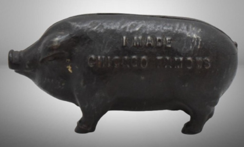 Cast Iron "I Made Chicago Famous" pig bank, mrkd. Copyright 1902