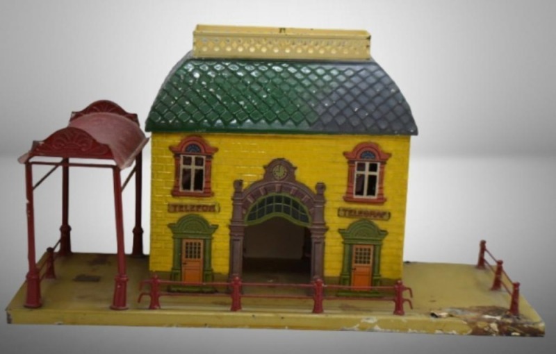 German lithographed tin train station, "Bing" plate on left side of base