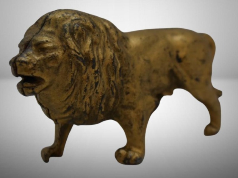 Cast Iron Striding Lion still bank, gold colored