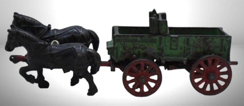 Cast Iron Arcade McCormick Deering wagon pulled by 2 horses